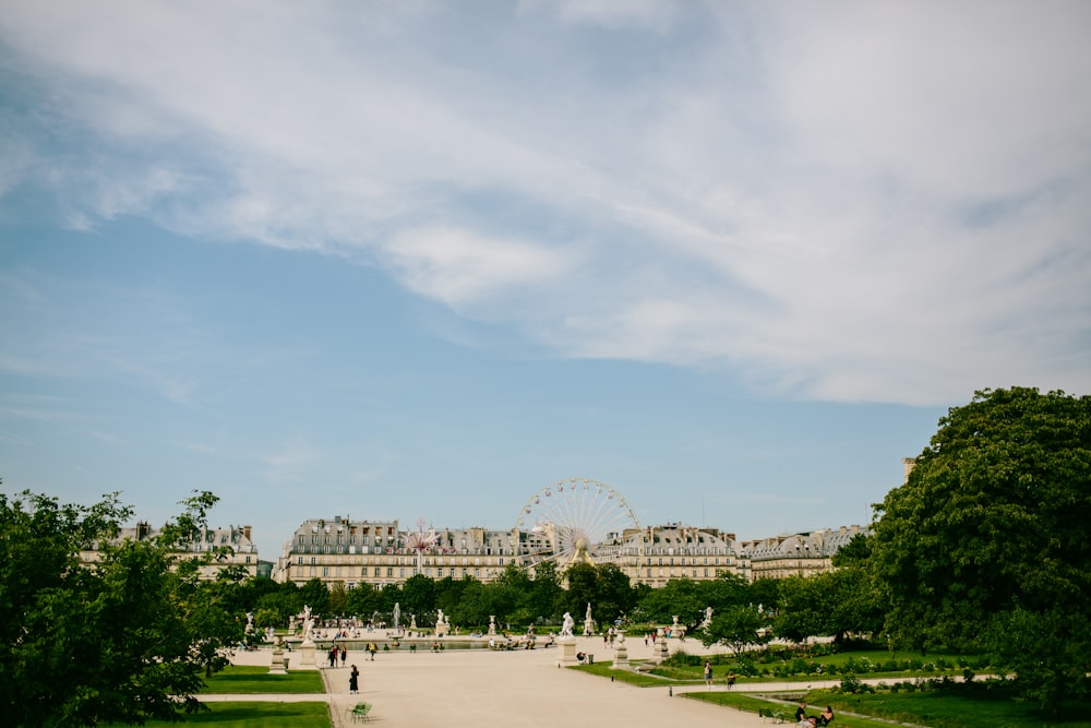 buildings beside green trees