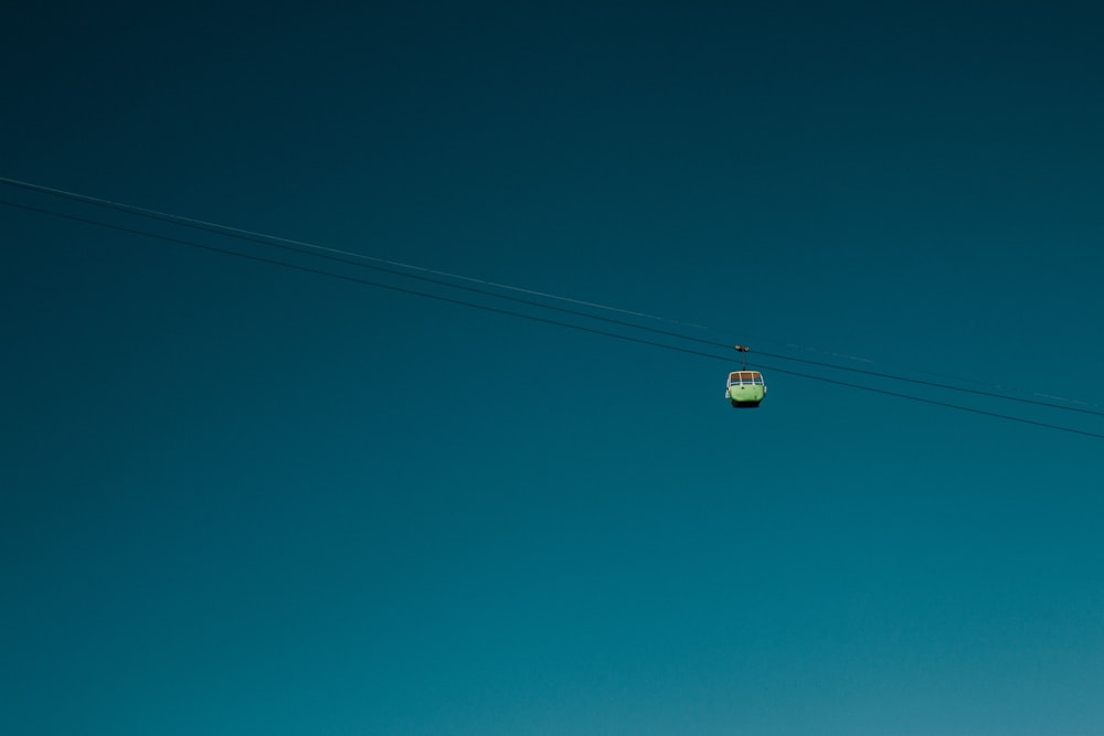 green cable cart crossing wire