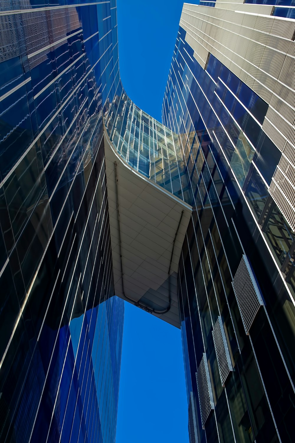 low-angle photography of curtain wall building