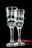 Two elegant, clear glass goblets with a textured, wavy surface are positioned side by side against a dark background. Subtle reflections and highlights add depth to the transparent material, creating a sophisticated and refined atmosphere.