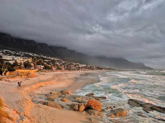 water crashing to rocks in Camps Bay South Africa