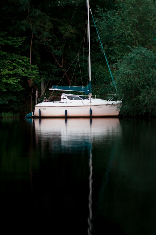 white and green motorboat on body of water in Yarm United Kingdom