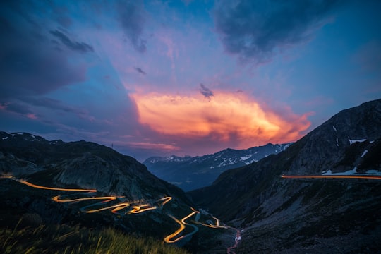 timelapse photo of zigzag road during nighttime in Gotthard Pass Switzerland