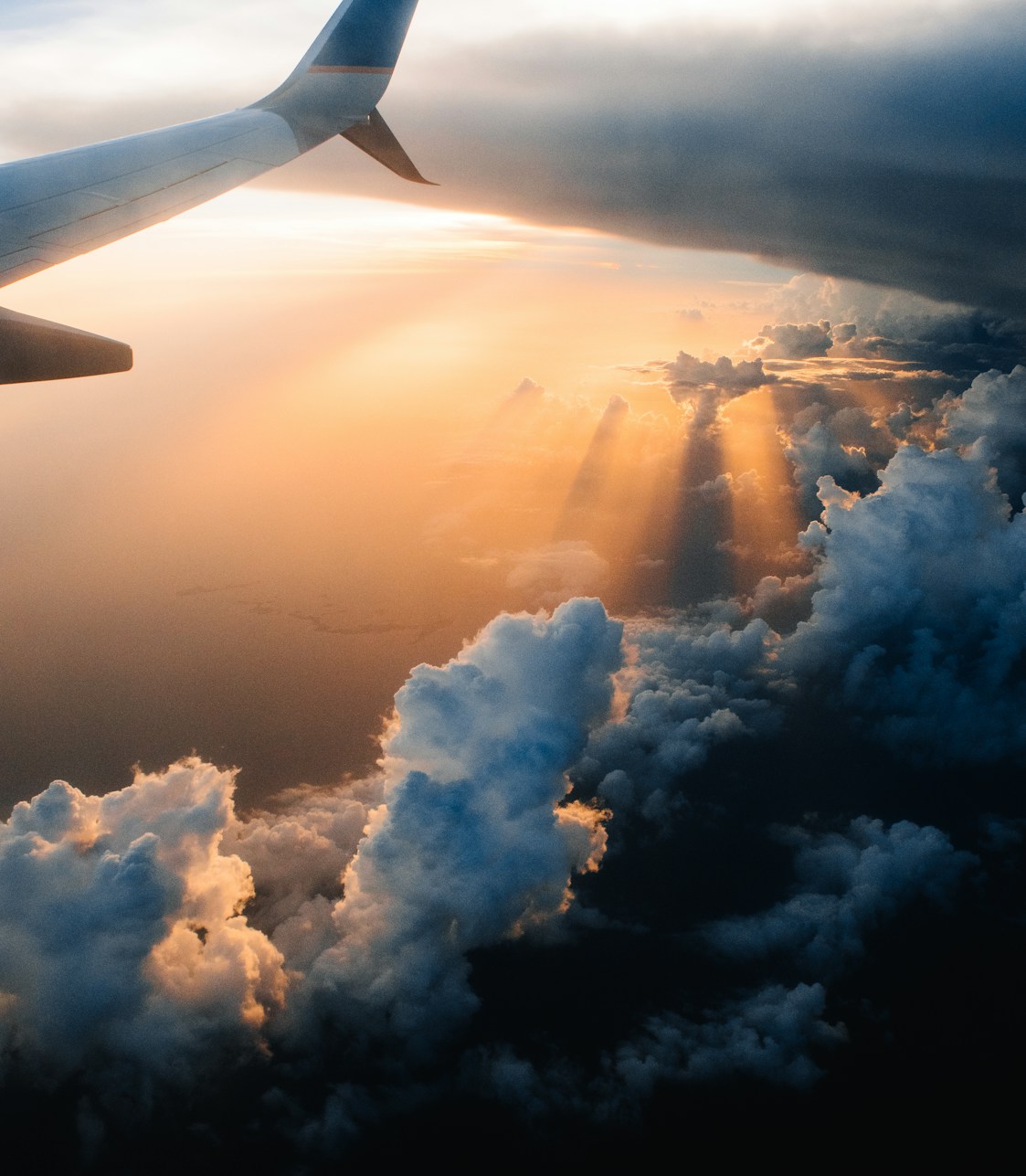 airplane on sky during golden hour