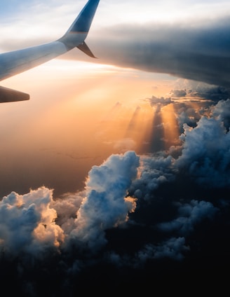 airplane on sky during golden hour