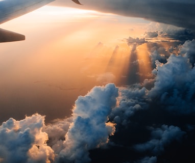 airplane on sky during golden hour