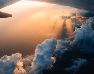 airplane on sky during golden hour