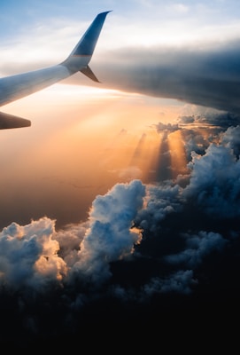 airplane on sky during golden hour