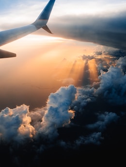 airplane on sky during golden hour