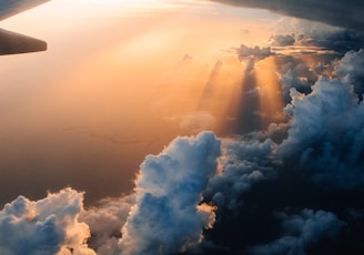 airplane on sky during golden hour