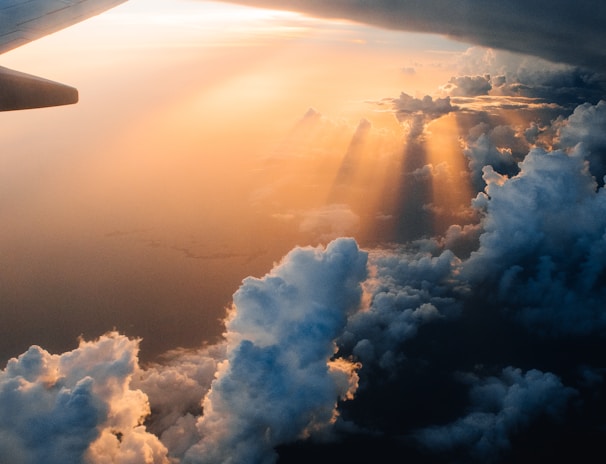 airplane on sky during golden hour