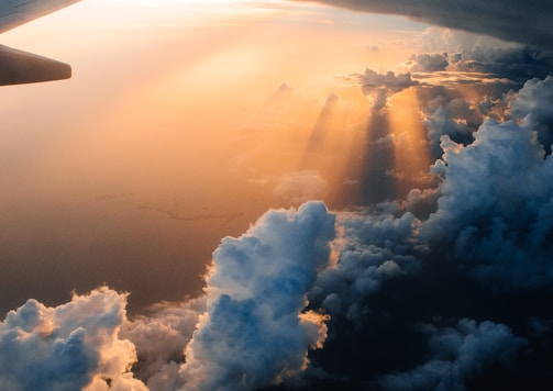 airplane on sky during golden hour