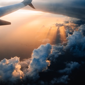 airplane on sky during golden hour