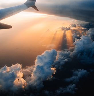 airplane on sky during golden hour