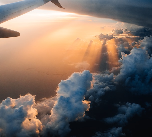 airplane on sky during golden hour