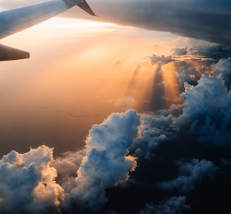 airplane on sky during golden hour