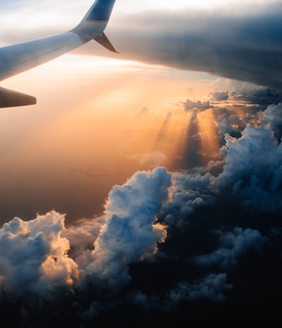 airplane on sky during golden hour