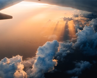 airplane on sky during golden hour