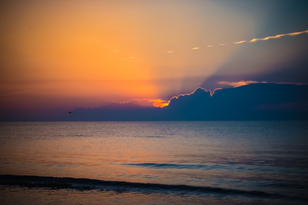 landscape photo of seashore at golden hour