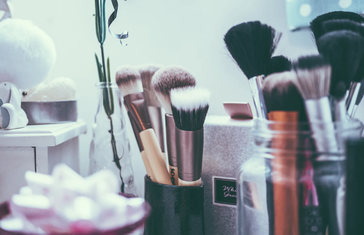 Woman using a facial lifting beauty device at home, wellness editorial photography