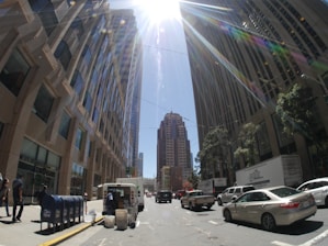 A Sky Delivery LLC truck making a swift delivery in a bustling city street.