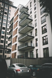 cars parked beside building