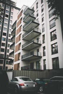 cars parked beside building