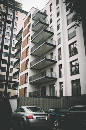 cars parked beside building