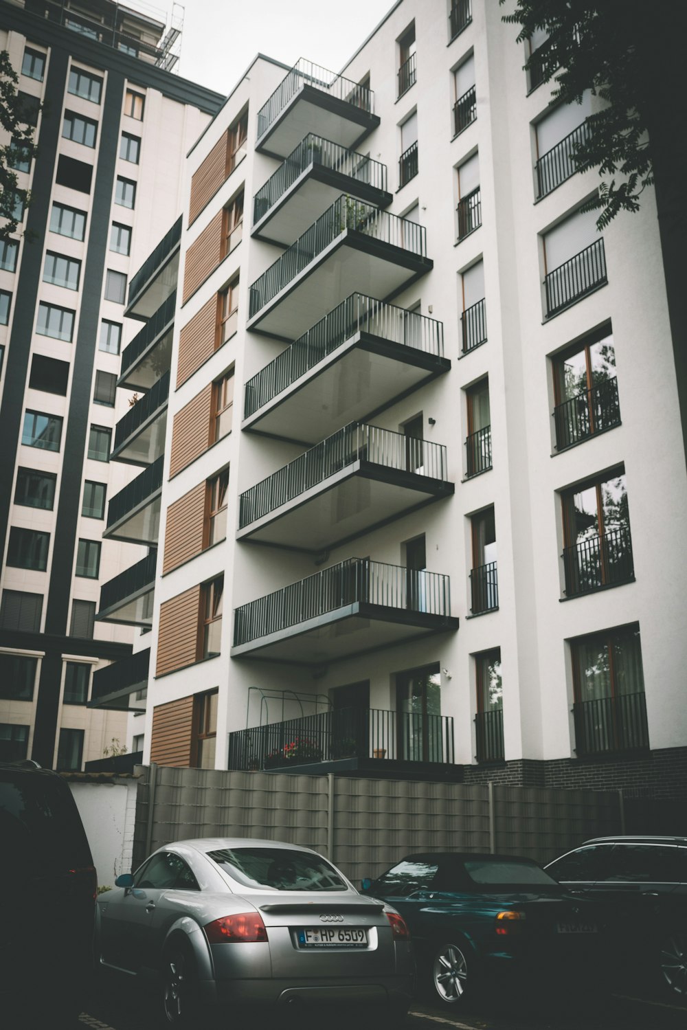 cars parked beside building