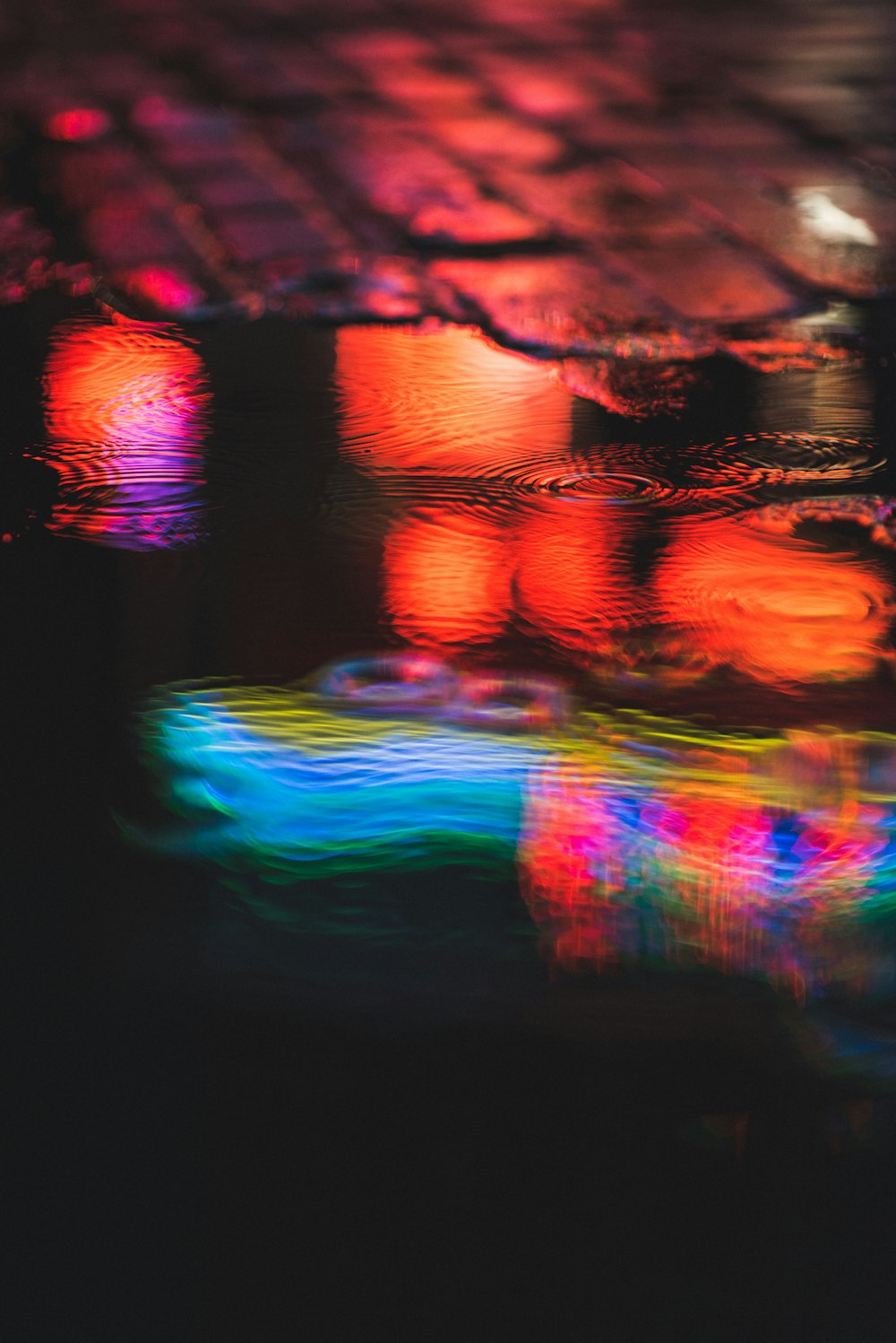 red and blue light reflection on water