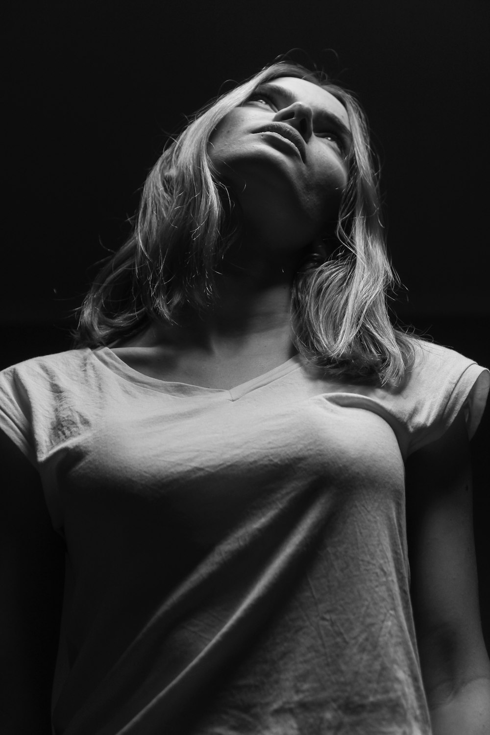 grayscale photo of a woman with shirt