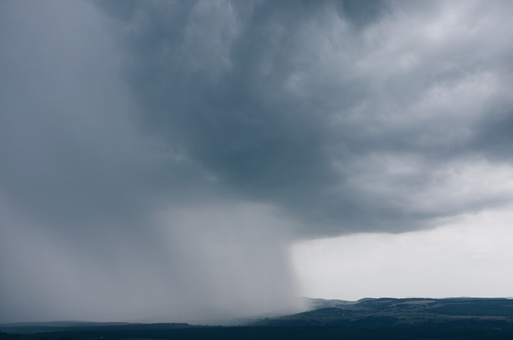 gray cumulonimbus rainclouds during daytime