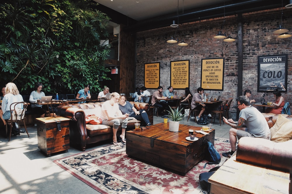 people sitting inside room