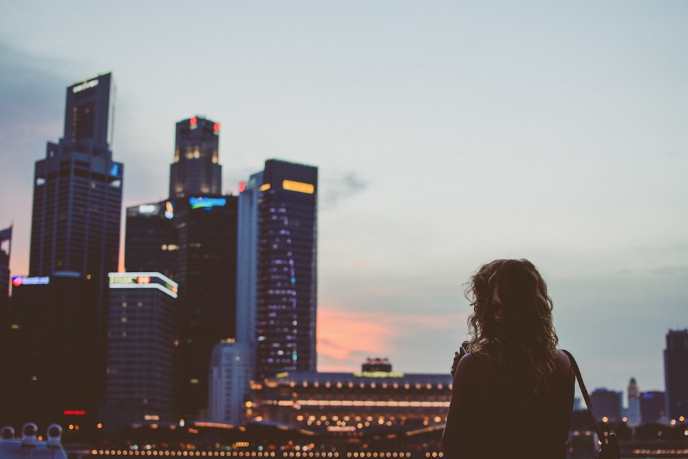 woman looking at the buildings