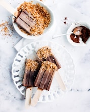 popsicles on white ceramic plate