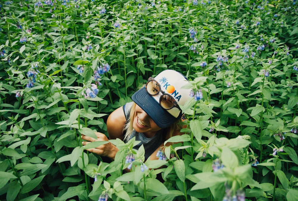 woman surrounded by grasses