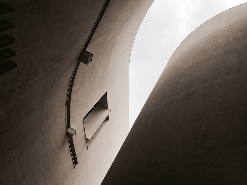 low angle photography of brown concrete building