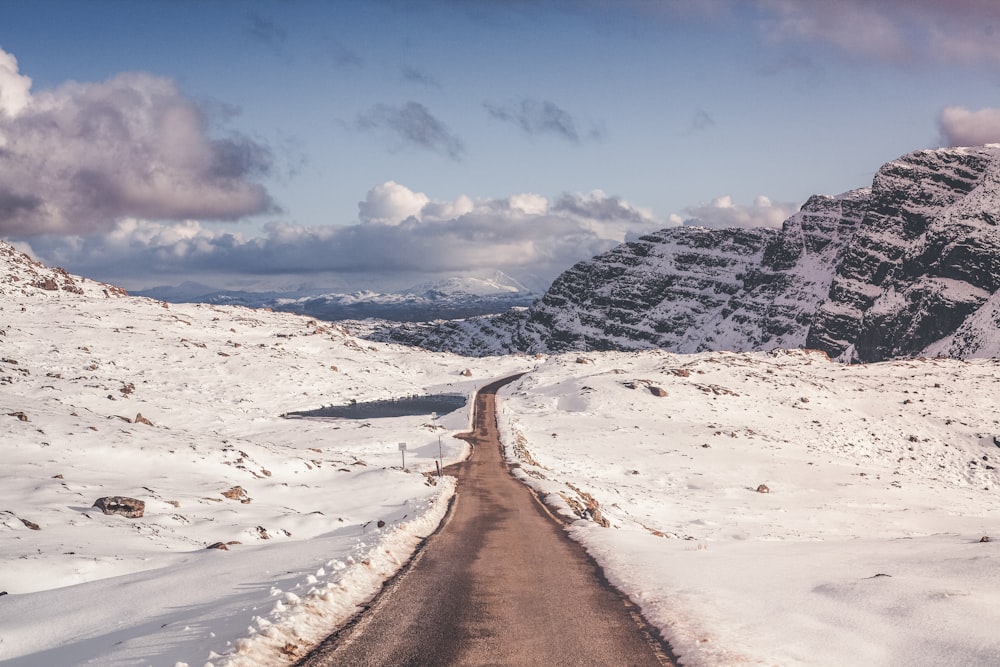 road surrounded by snow