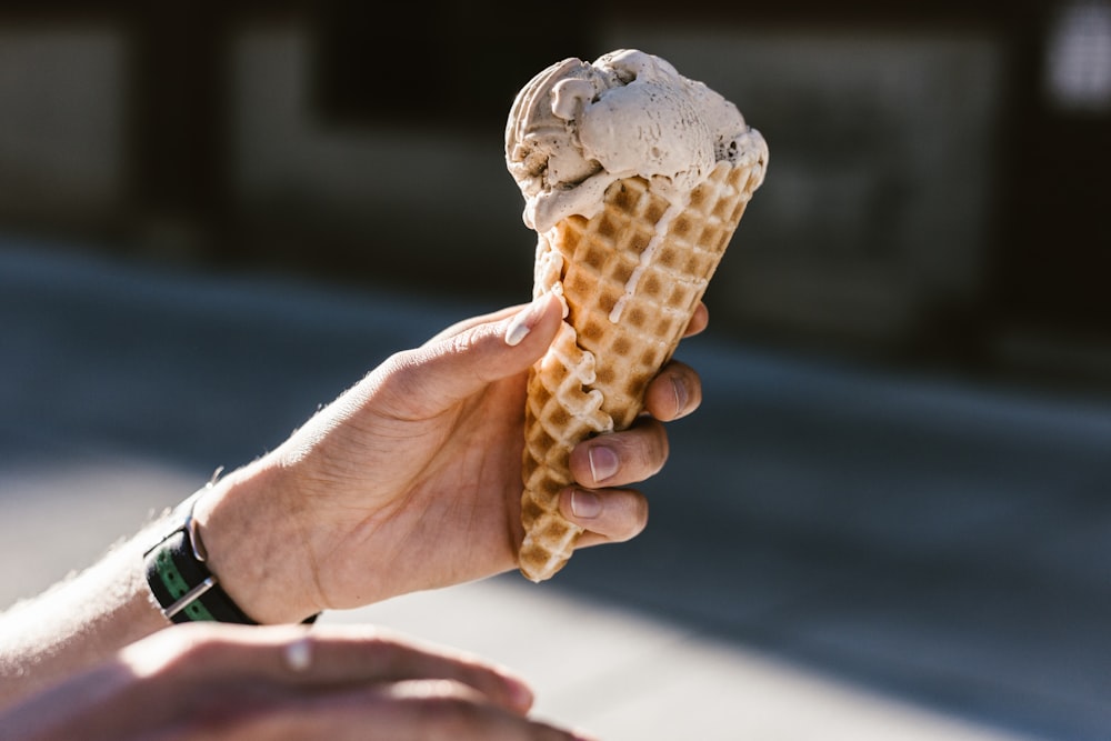 person holding icecream