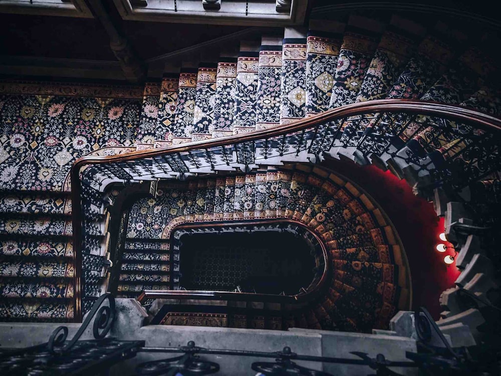 aerial photo of spiral stairs near window