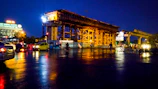 Night shot of a well-lit construction site showcasing structure details.