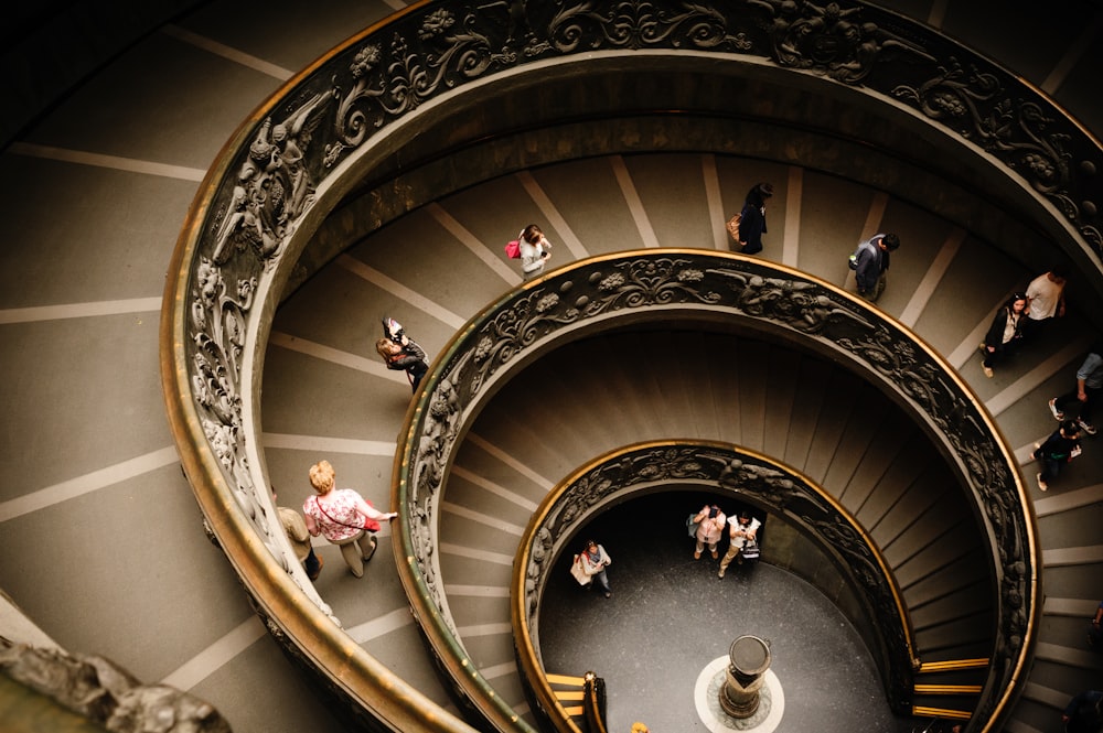 photography of people walking on stairwell