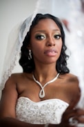 selective focus photo woman wearing wedding veil