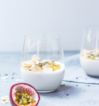 clear glass cup with white liquid