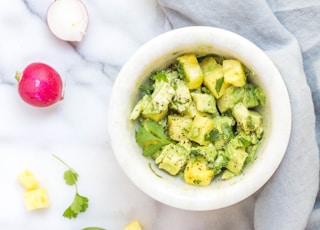 bowl of sliced yellow fruit