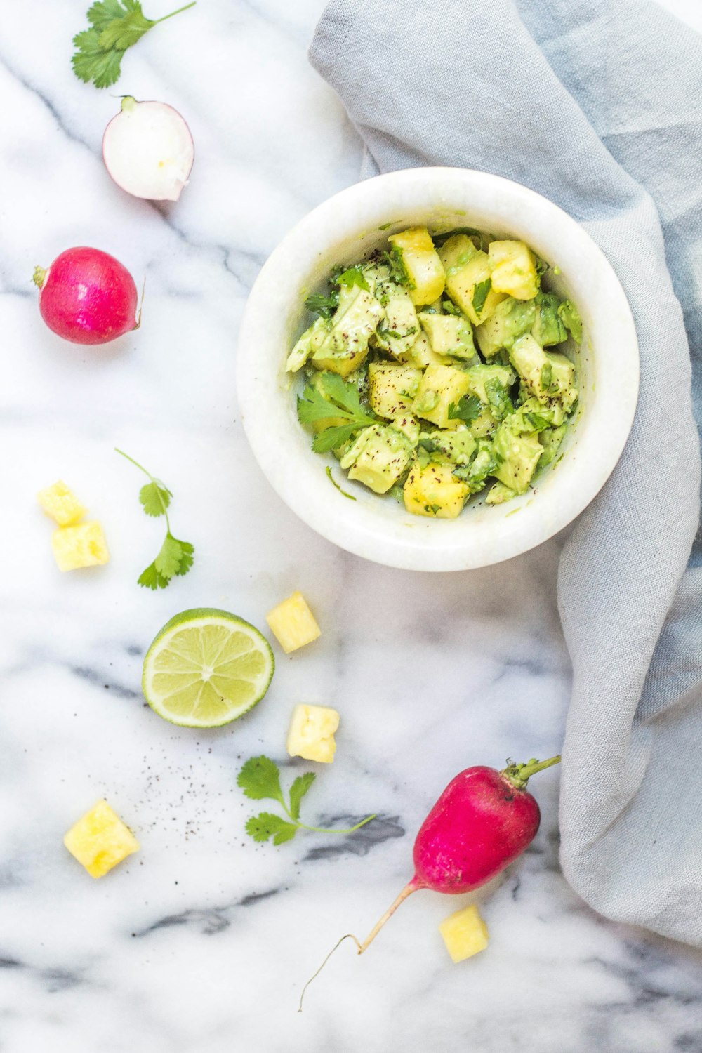 bowl of sliced yellow fruit