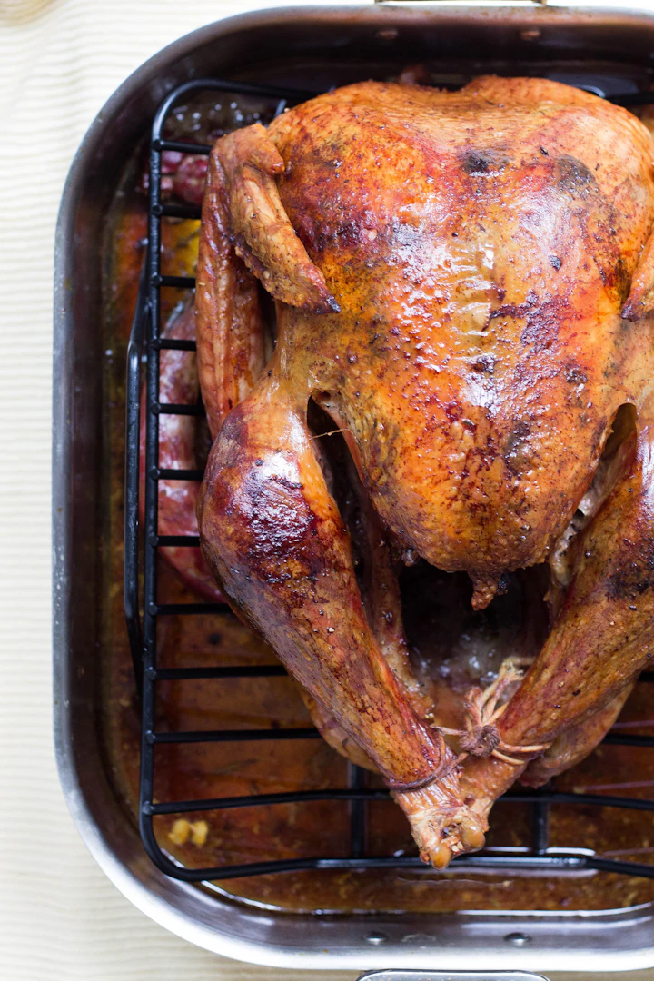 A traditional roast cooking in a roasting tray