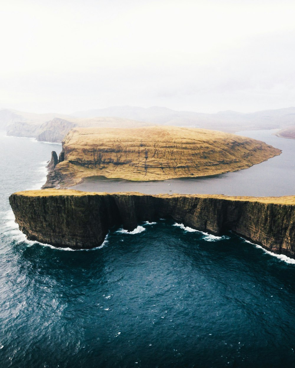 body of water across moutain