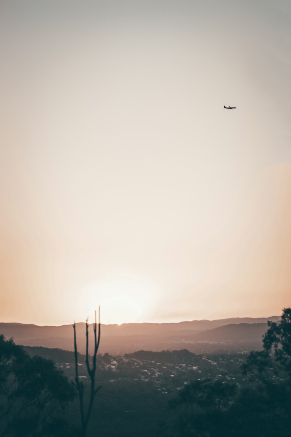 The sunset going down into the horizon in the country.