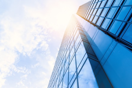 low-angle photo of curtain wall building